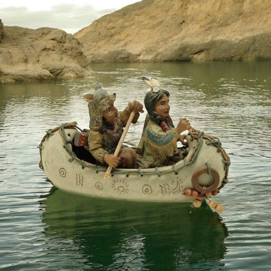 2 indianer i en kanot
